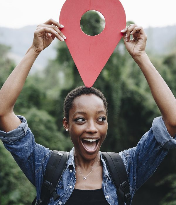 African American woman with a checkpoint symbol